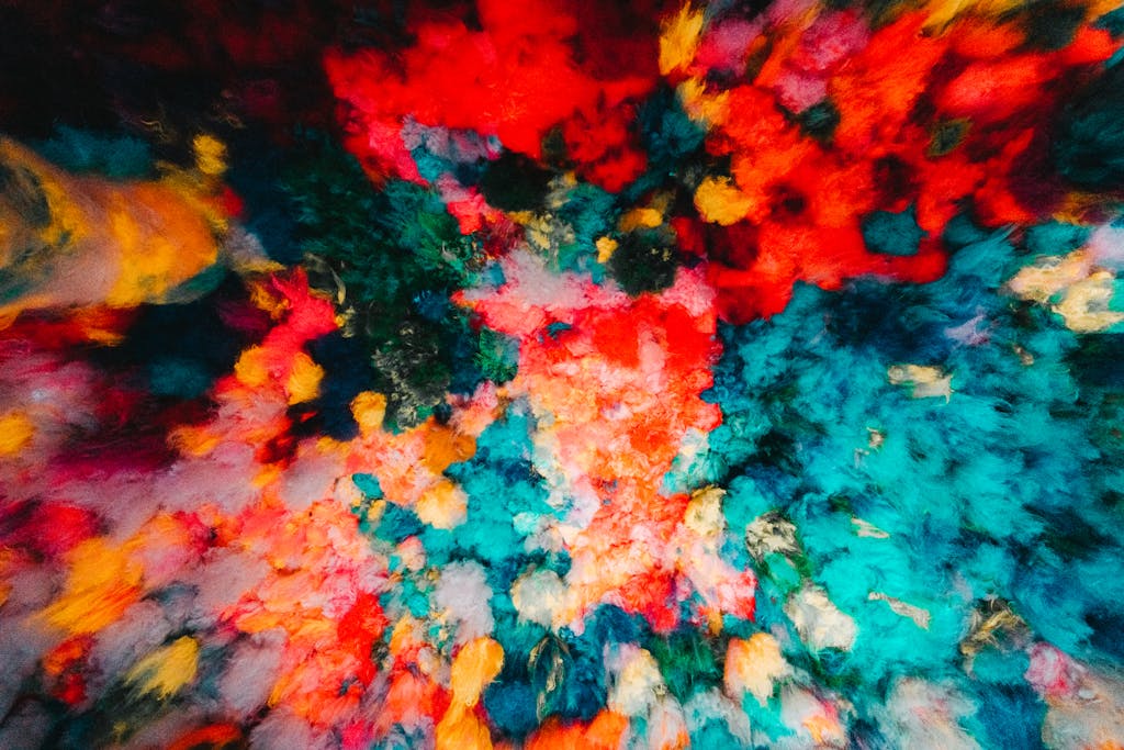 Colorful abstract art installation on a ceiling, showcasing a vibrant spectrum of hues.