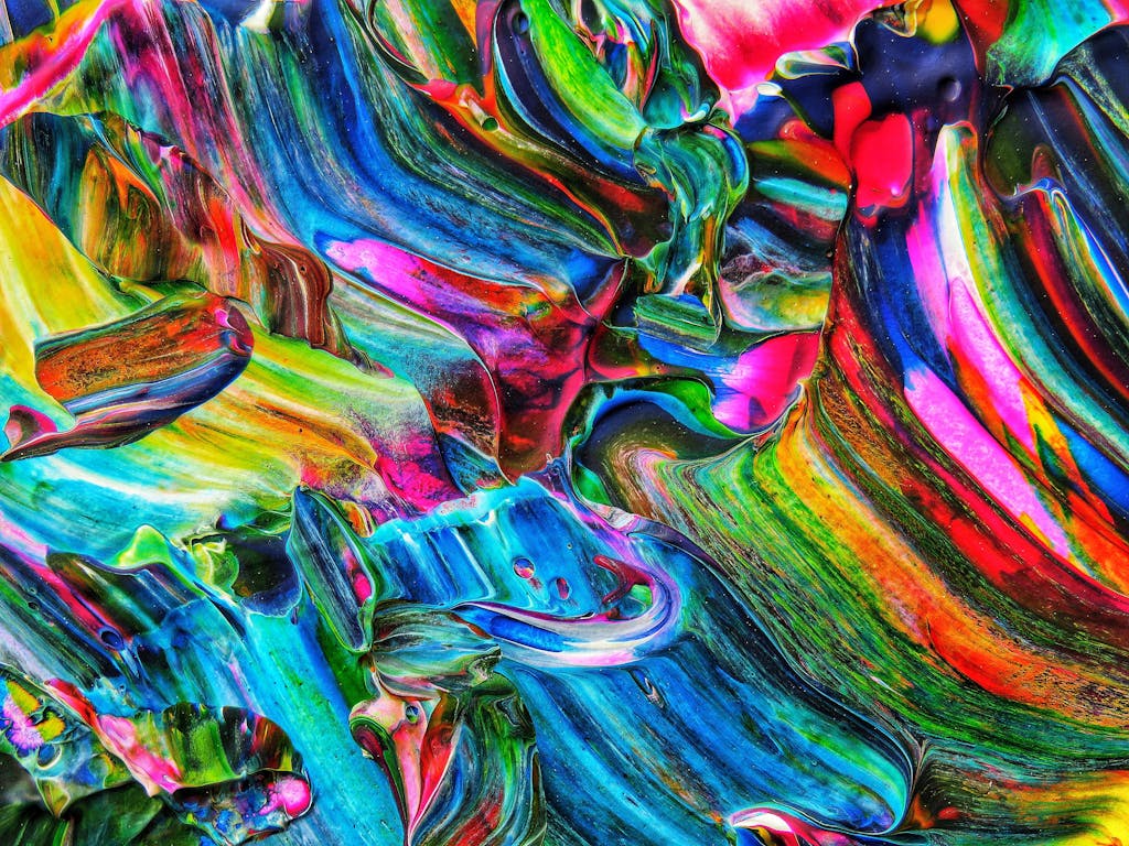 Colorful abstract design with vivid acrylic paint swirls creating a vibrant artistic pattern.